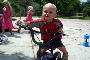 He can't pedal yet but he loves it!
