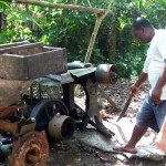 A machine to grind coffee, corn, etc. 